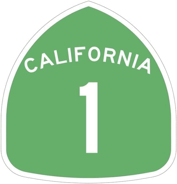 A green highway sign with the number 1 in california.