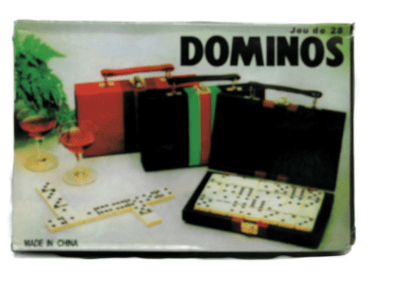 A box of dominoes sitting on top of a table.