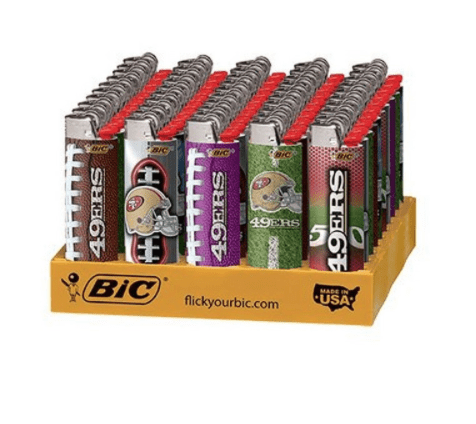 A display of bic lighters with football designs.