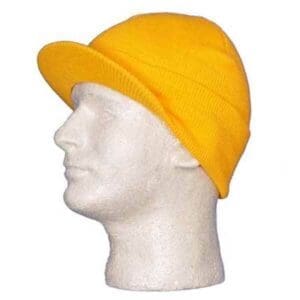 A man wearing a yellow hat on top of his head.