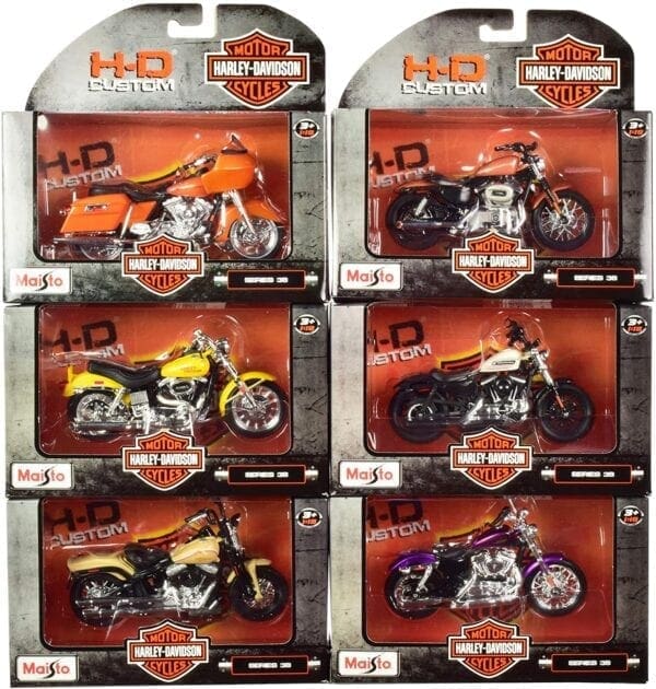 A set of six harley davidson die cast motorcycles.