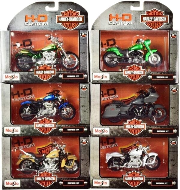 A set of six different motorcycles in packages.