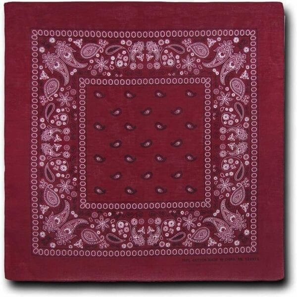 A burgundy bandana with a pattern on it.