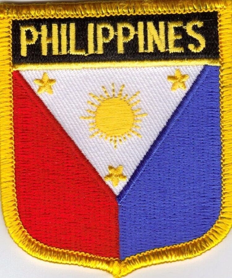 A patch of the philippines with a sun and stars.