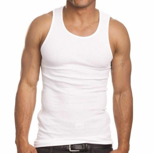 A man wearing white tank top and jeans.