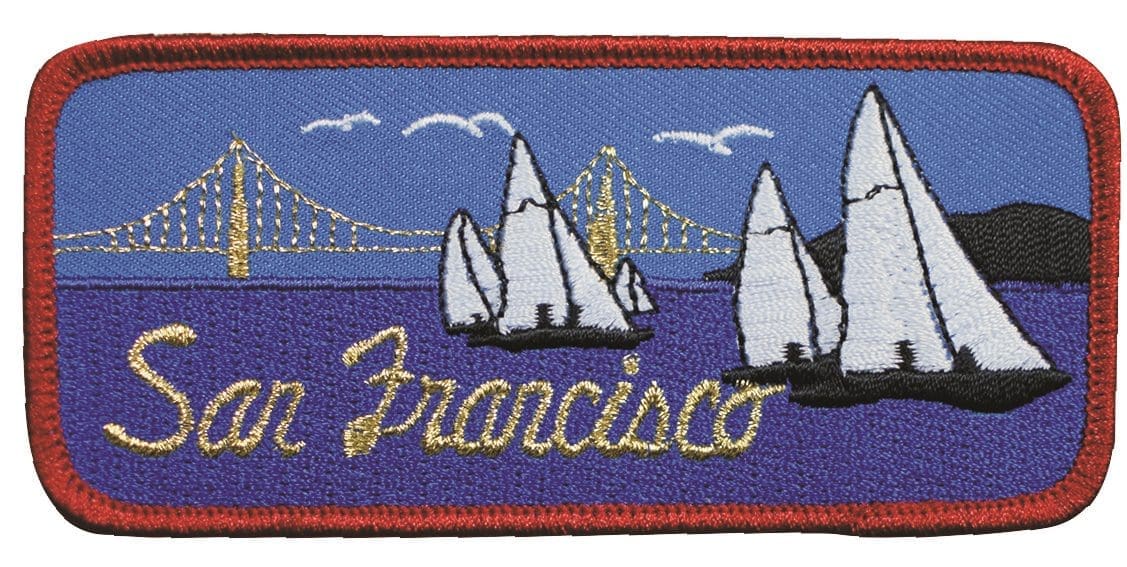 A patch of the bay bridge with sailboats in it.