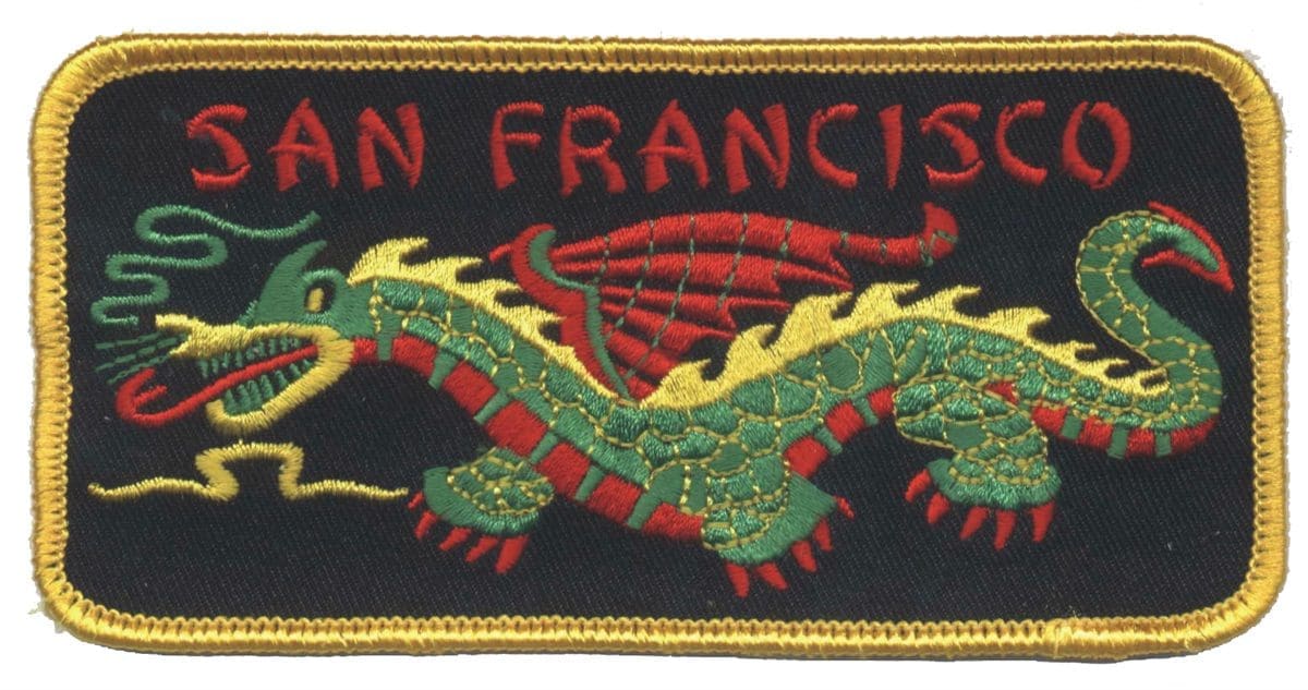 A patch of the city of san francisco with a dragon on it.