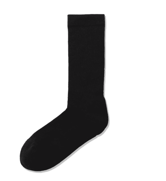 A pair of black socks are on the ground.