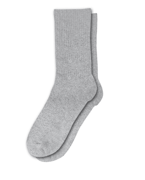 A pair of grey socks with white stripes on them.